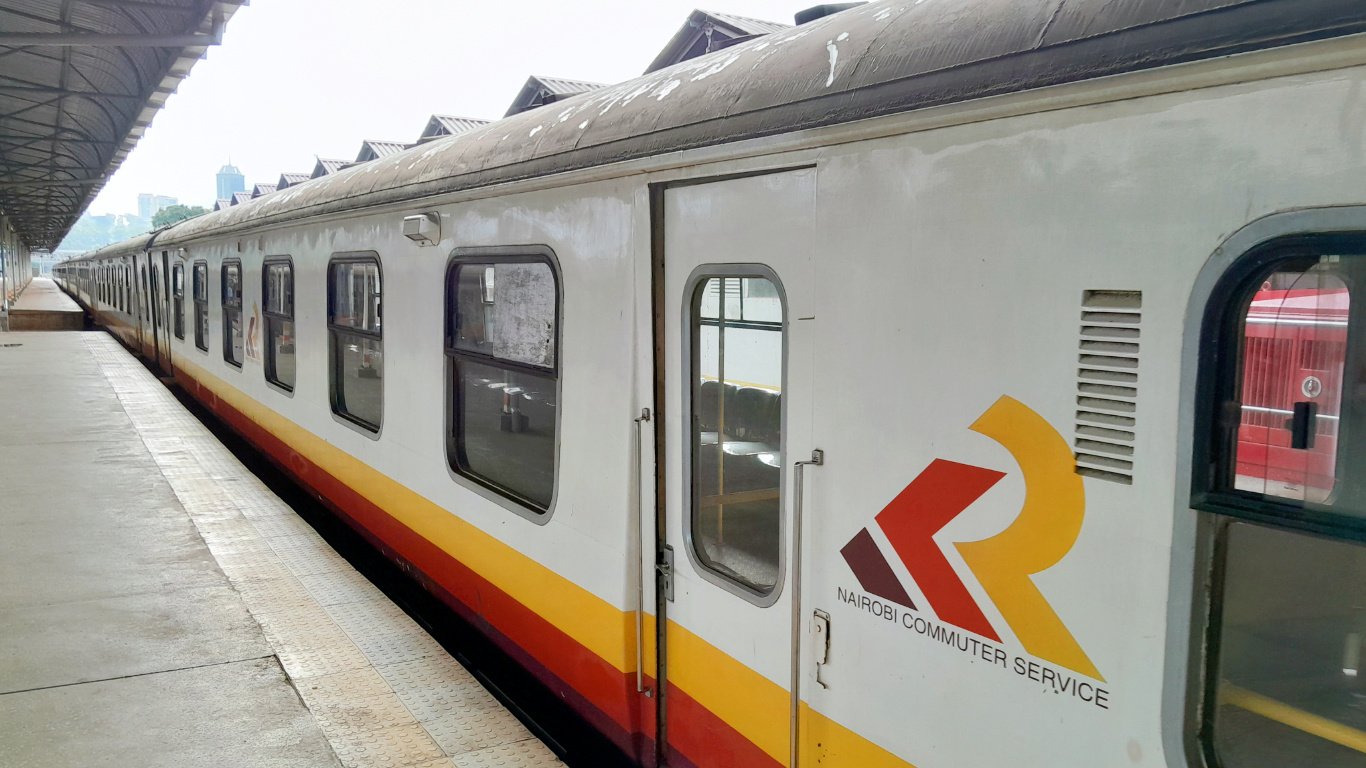 At five o'clock, the sun dipped below the horizon, painting the sky in fiery hues of orange and purple. Finally reaching its destination, the train pulled into the Nairobi Central Station.